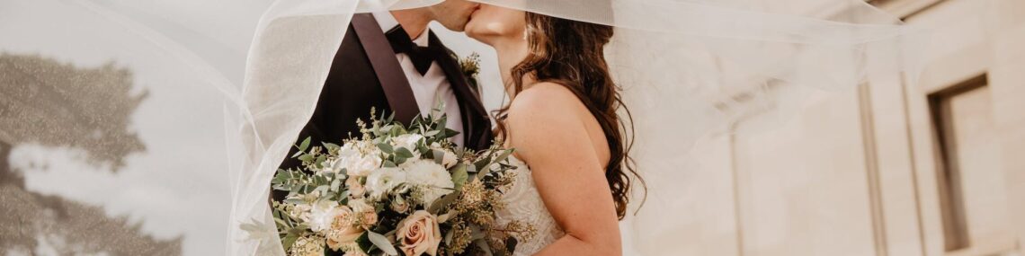 man and woman kissing